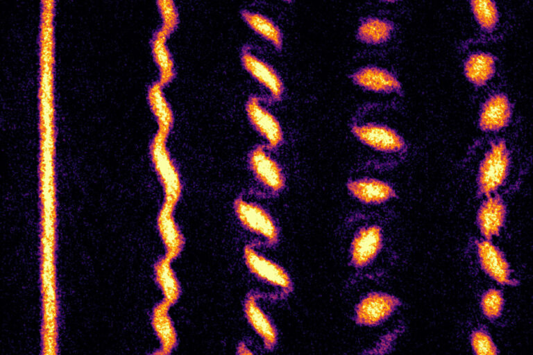 Physicists observe ultracold atoms forming crystal of quantum tornadoes