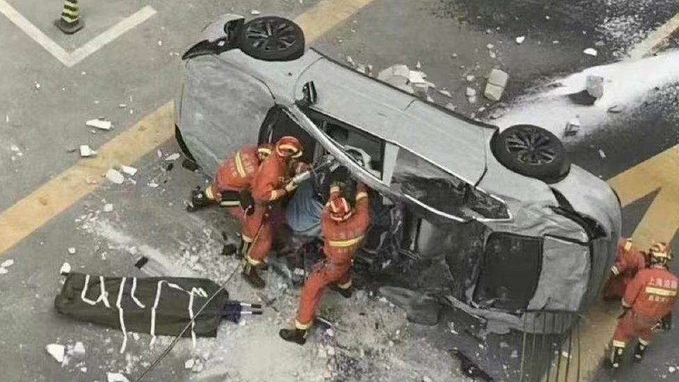 Two killed as Nio electric car falls from third-floor office in Shanghai