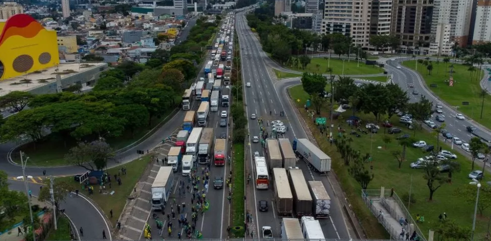 Bolsonaro tells protesting truckers to clear roads