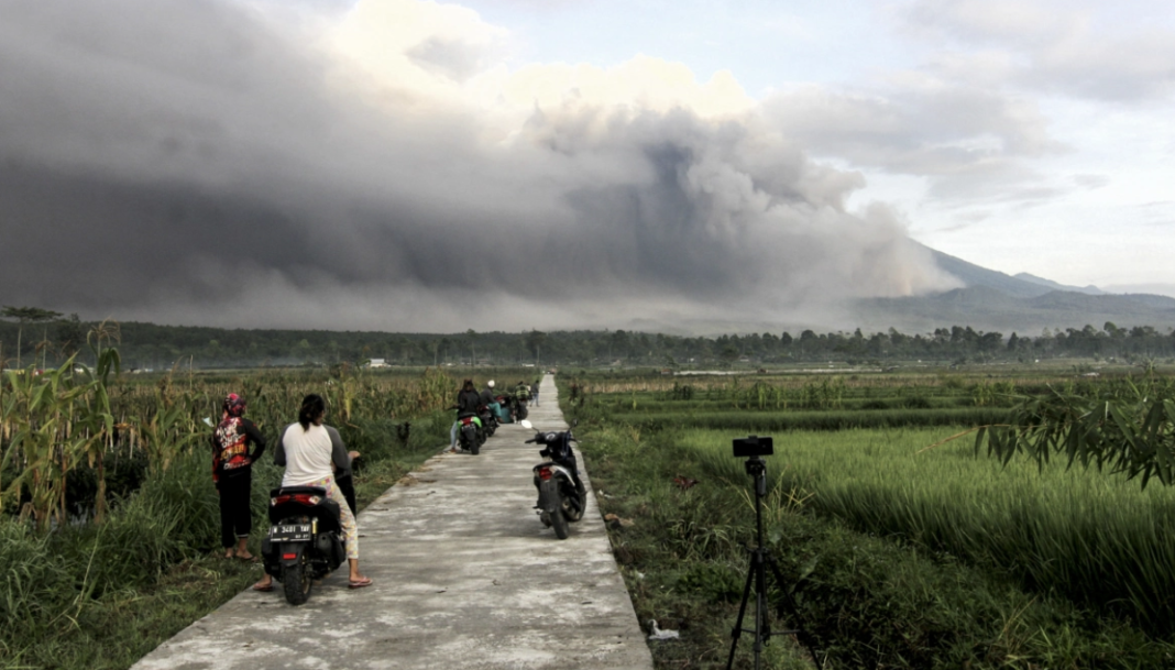 Indonesia raises alert to highest level as volcano erupts on Java island