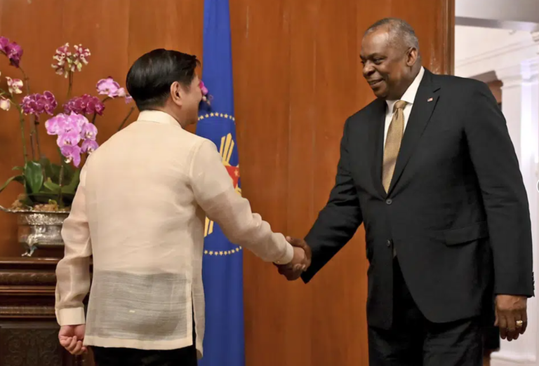U.S. secures deal on bases to complete arc around China