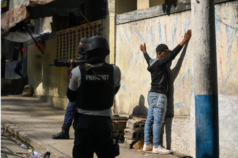 Suspected Haiti gang members stoned, set on fire by crowd