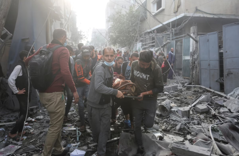 Israel bombs hundreds of targets in Gaza as truce talks continue
