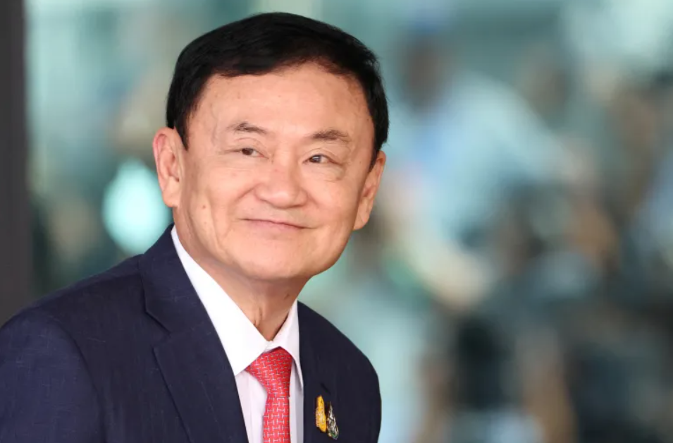 Former Thai PM Thaksin charged with royal insult