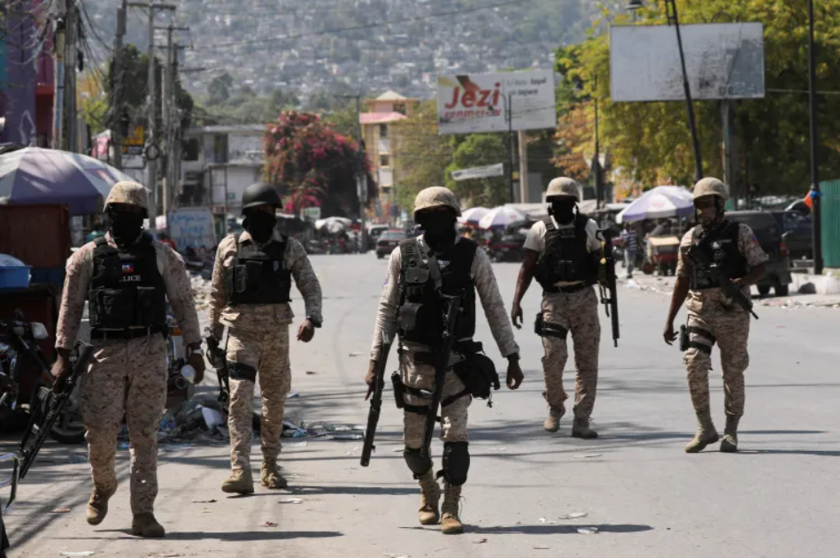 At least 12 bodies found after gang attacks in upscale Haiti suburb