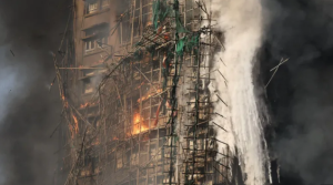 Hong Kong fire that killed at least 75 'under control' but hundreds missing
